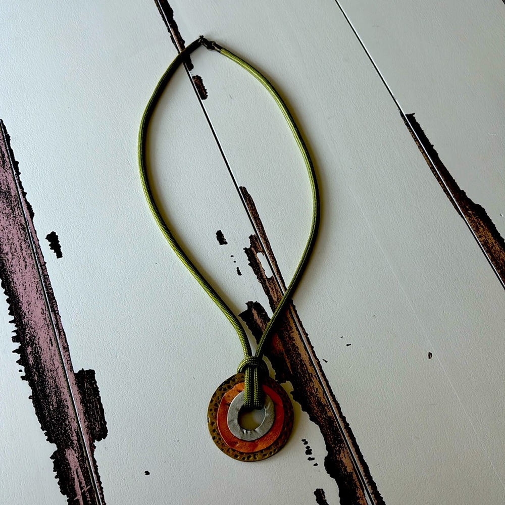 Green fabric necklace with metal decor